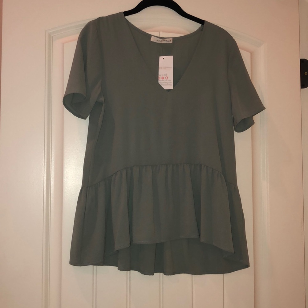 Float sage peplum top